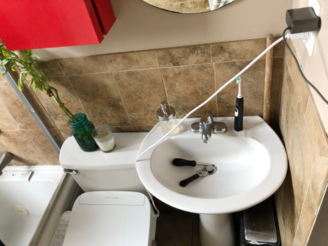 The cable is short, and, yes, you need to keep it plugged in. This was probably a fire hazard of some sort, but you could always run an extension cord.